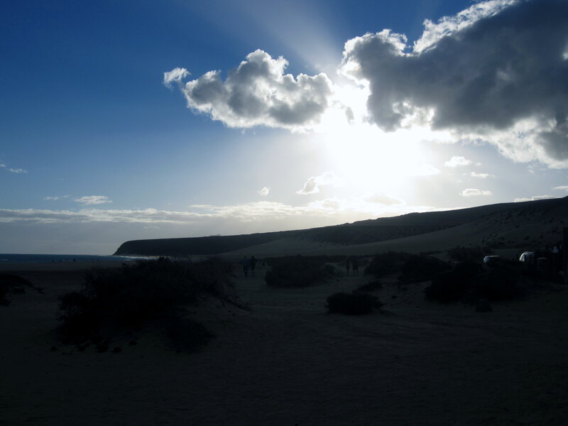 Silhouetted People on Beach — Blue, Dramatic, Afternoon