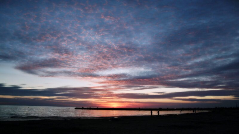Silhouetted People on Beach — Blue, Dramatic, Sunset, Photograph