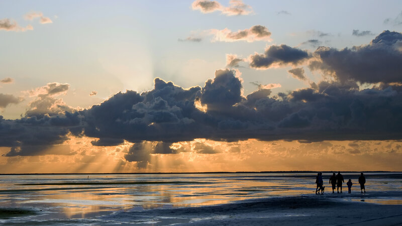 Silhouetted People on Beach — Blue, Dramatic, Sunset