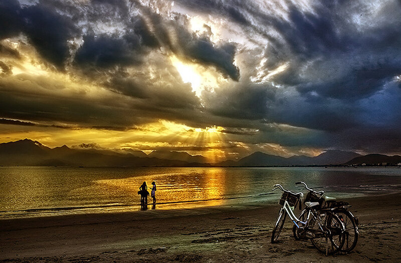 Silhouetted People on Beach — Gold