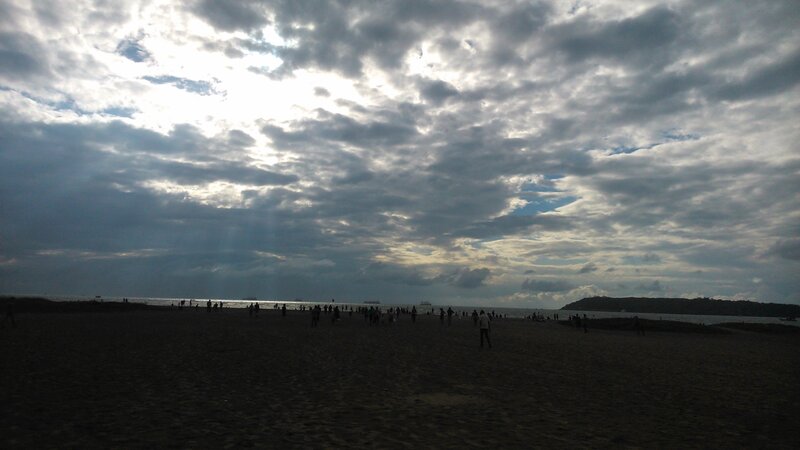 Silhouetted People on Beach — Gray