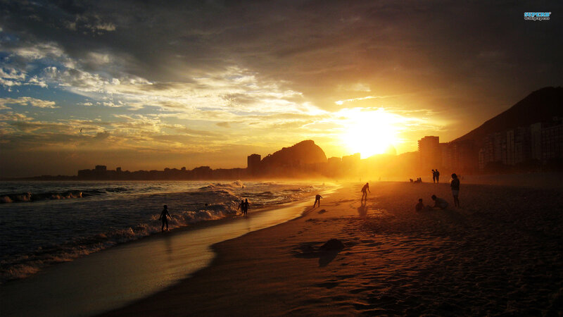 Silhouetted People on Beach — Orange, Dramatic, Sunset, Photograph