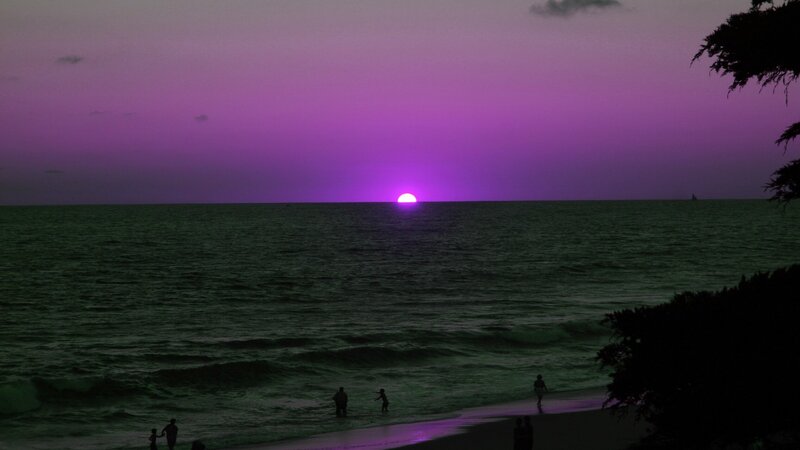 Silhouetted People on Beach — Purple, Dramatic, Sunset