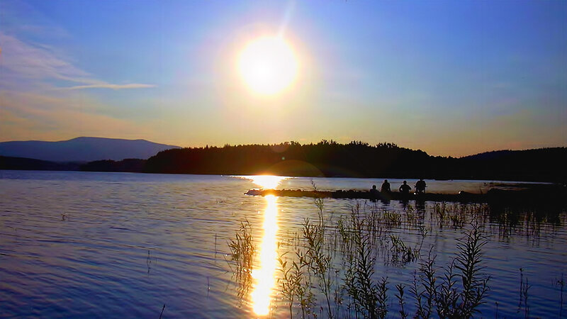 Silhouetted People on Dock — Blue
