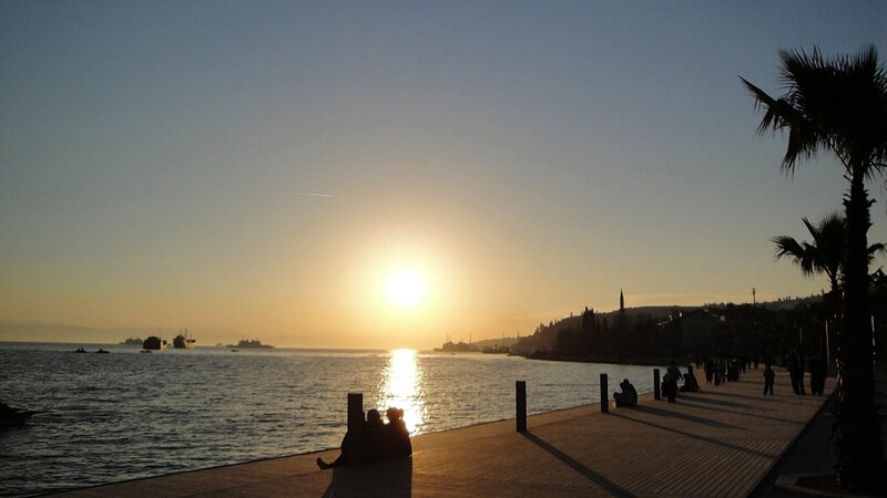 Silhouetted People on Pier — Blue, Serene