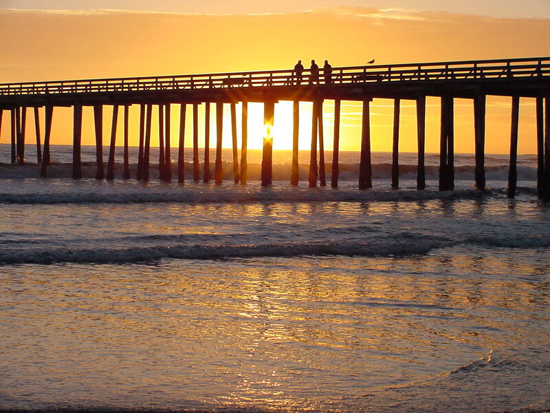 Silhouetted People on Pier