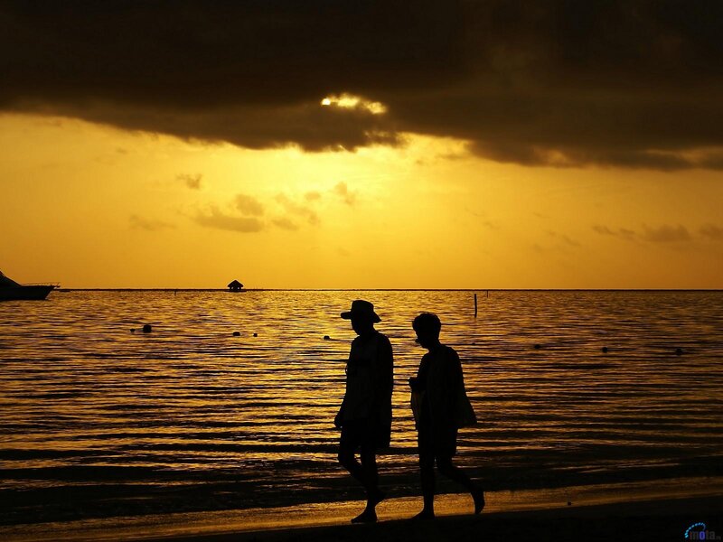 Silhouetted People Walking — Yellow