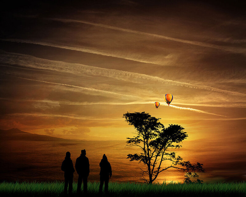 Silhouetted People Watching Balloons