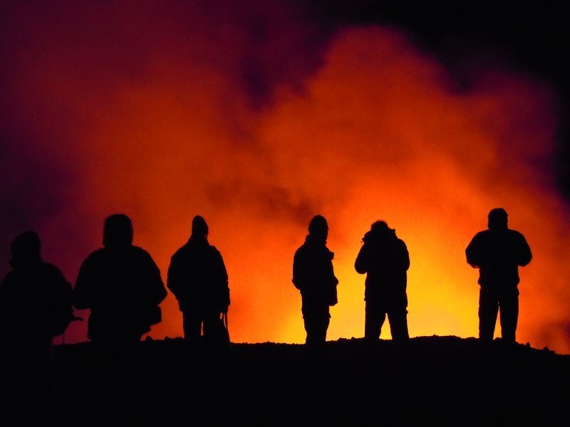 Silhouetted People Watching Eruption