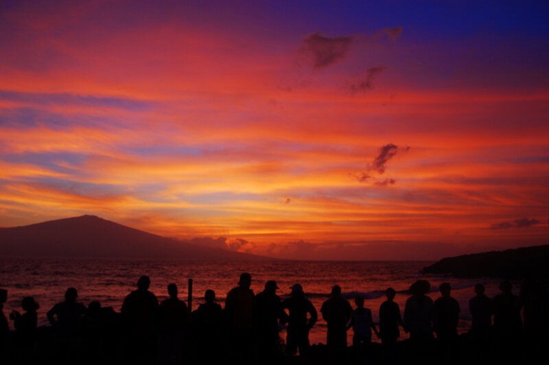 Silhouetted People Watching Sunset