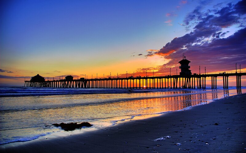 Silhouetted Pier at Sunset — Blue, Dramatic, Photograph