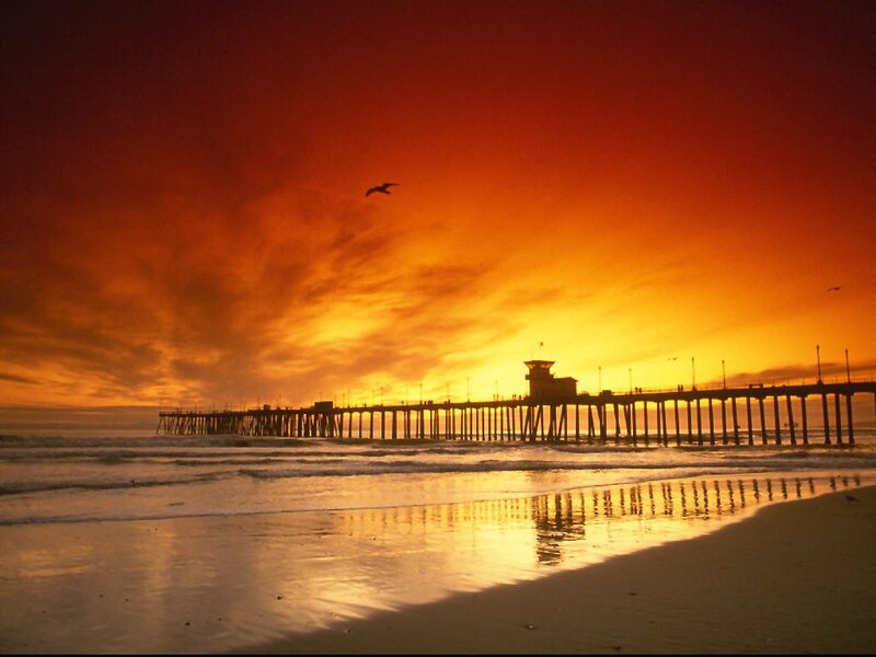 Silhouetted Pier at Sunset — Orange, Dramatic, Photograph, Ocean, Sky