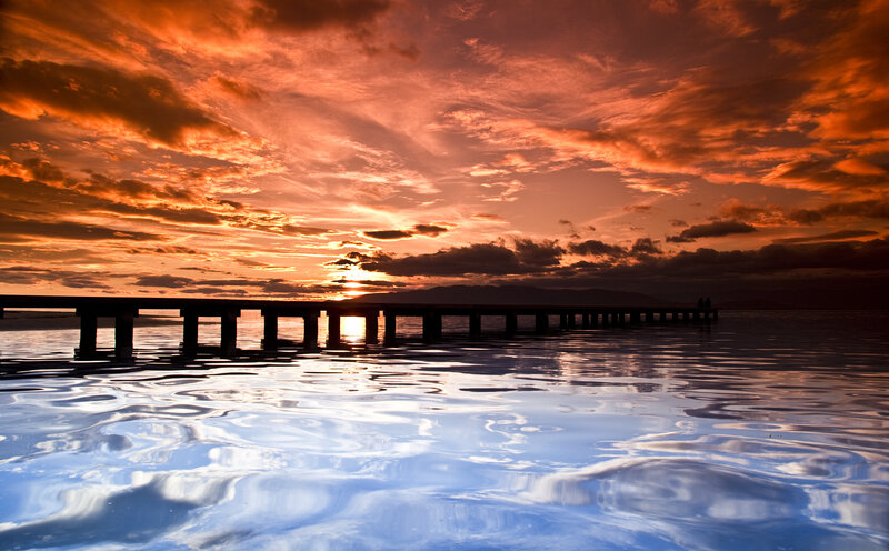 Silhouetted Pier at Sunset — Orange, Dramatic, Photograph, Sun