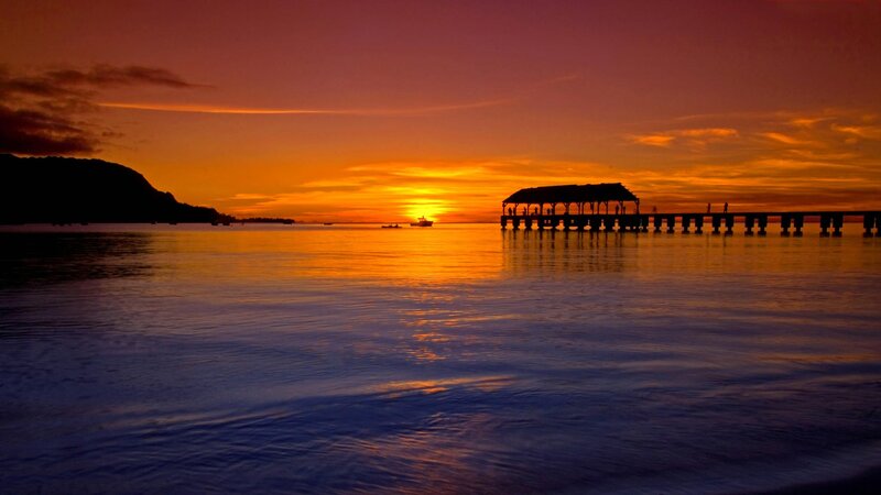 Silhouetted Pier at Sunset — Orange, Serene, Photograph, Boat, Mountain