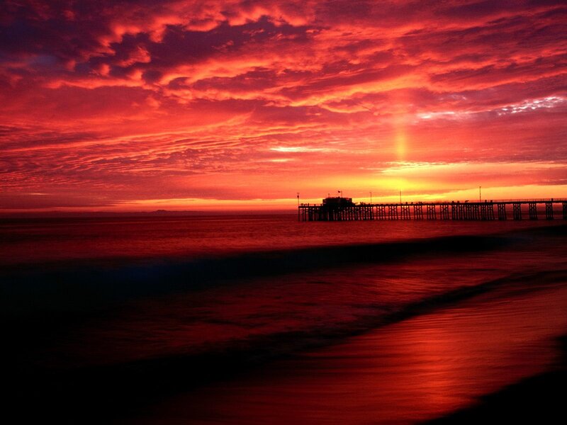 Silhouetted Pier at Sunset — Red