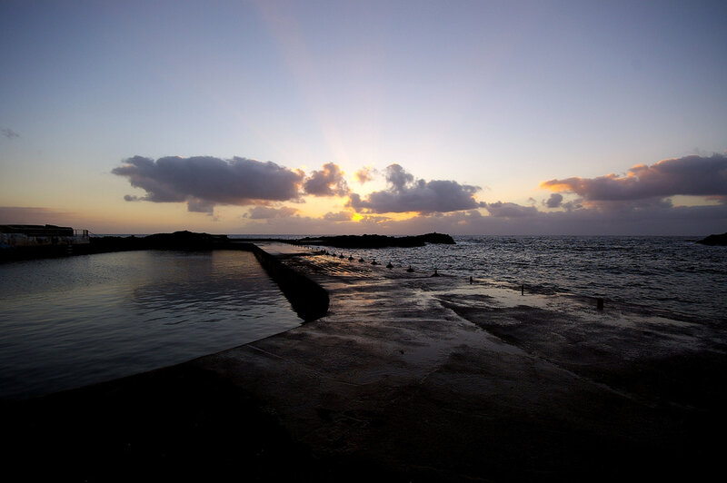 Silhouetted Pier at Sunset