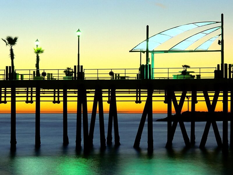 Silhouetted Pier at Sunset — Yellow, Serene