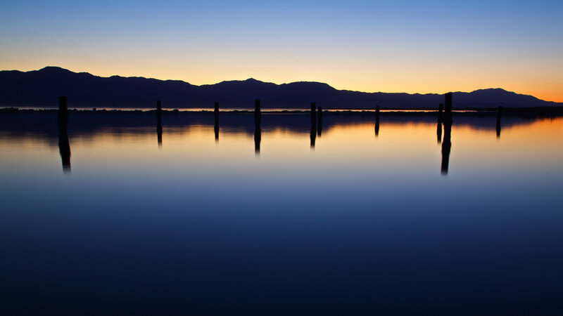 Silhouetted Posts at Sunset — Blue