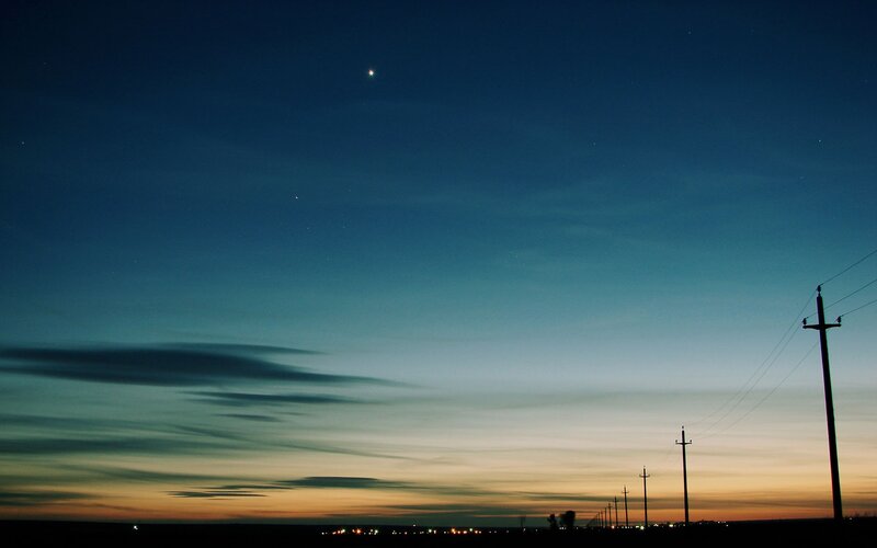 Silhouetted Power Poles — Blue, Serene