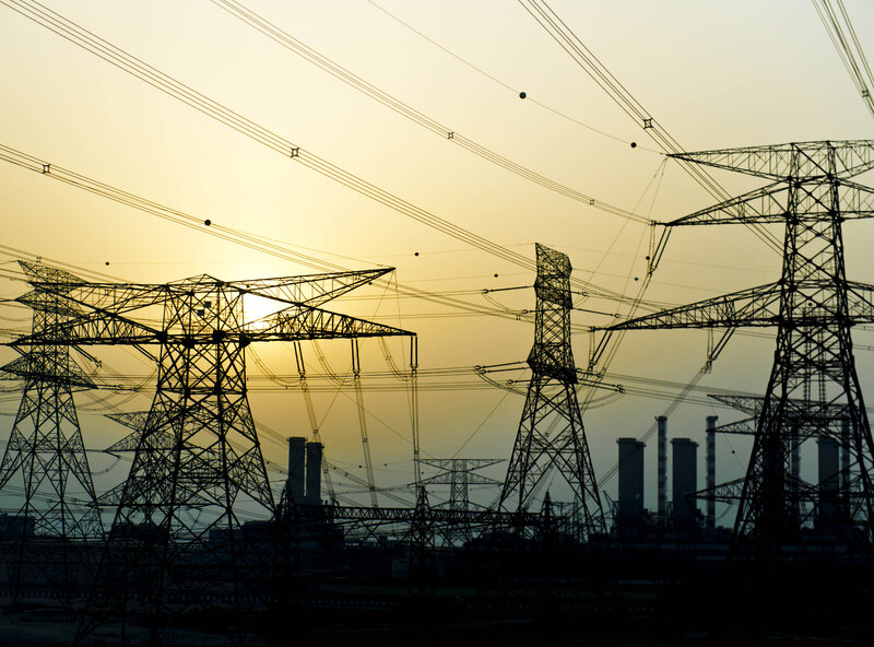 Silhouetted Power Towers — Yellow