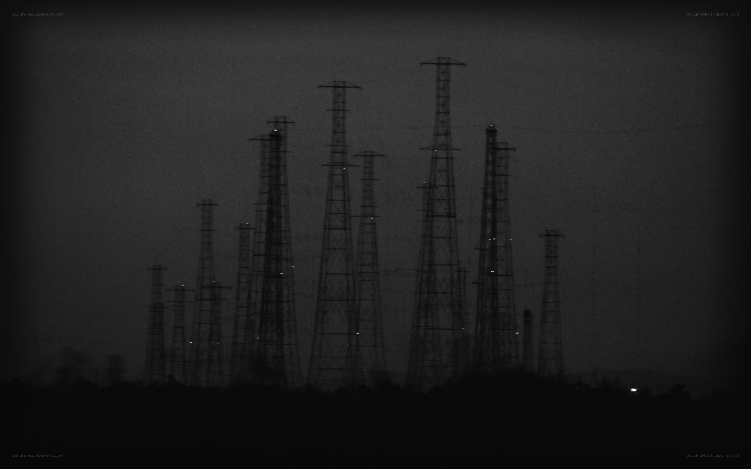 silhouetted power towers