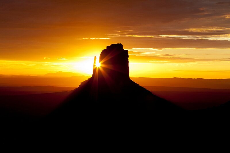 Silhouetted Rock Formation — Orange, Dramatic