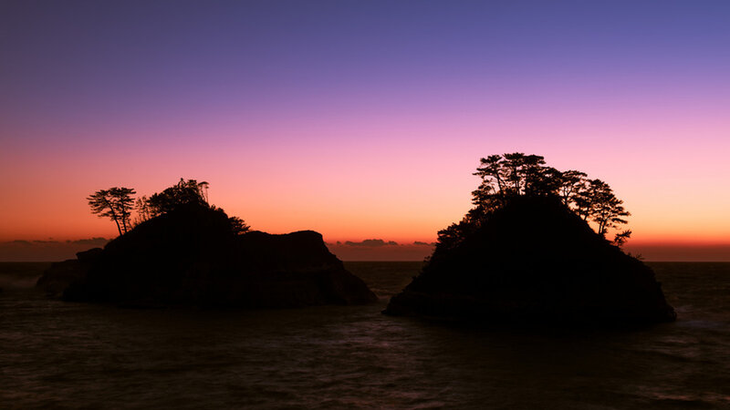 Silhouetted Rock Formations — Purple