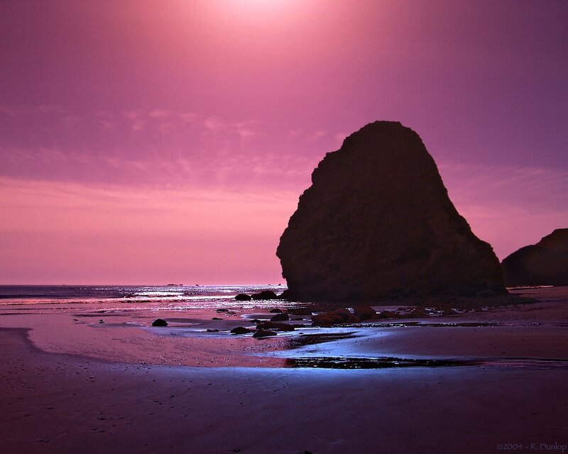 Silhouetted Rock on Beach
