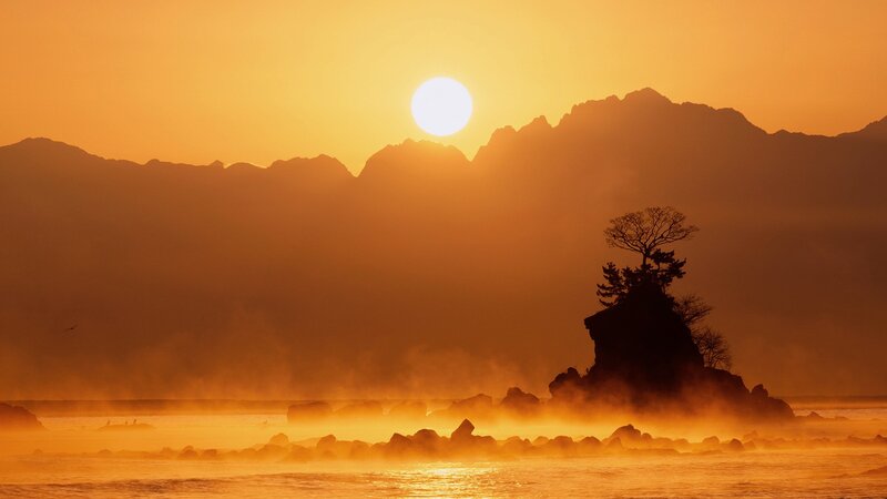 Silhouetted Rock with Tree