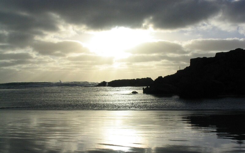 Silhouetted Rocks at Beach — Gray, Dramatic