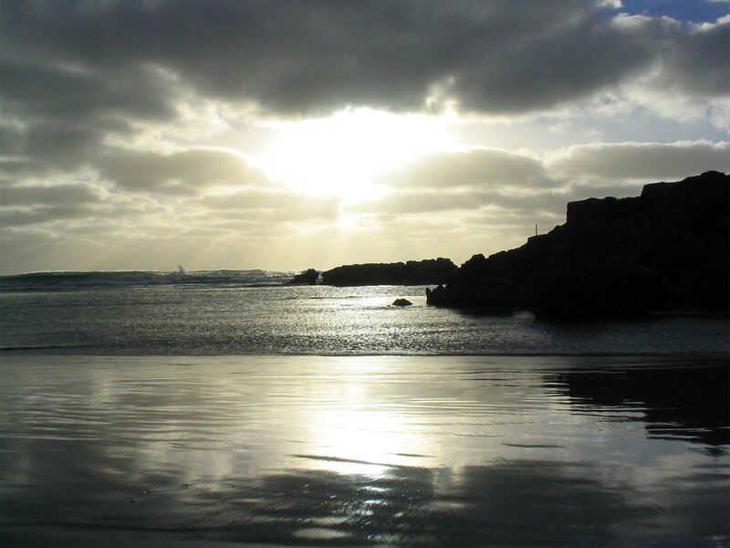 Silhouetted Rocks at Beach — Gray