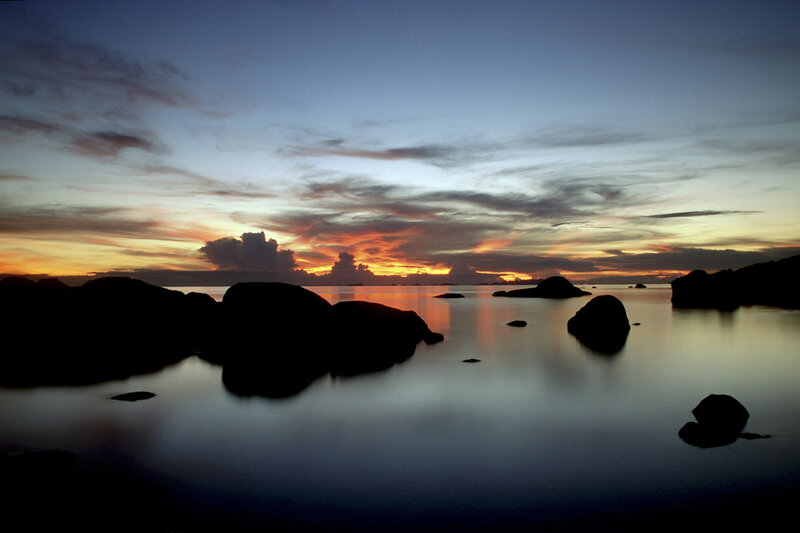Silhouetted Rocks at Sunset — Blue, Serene