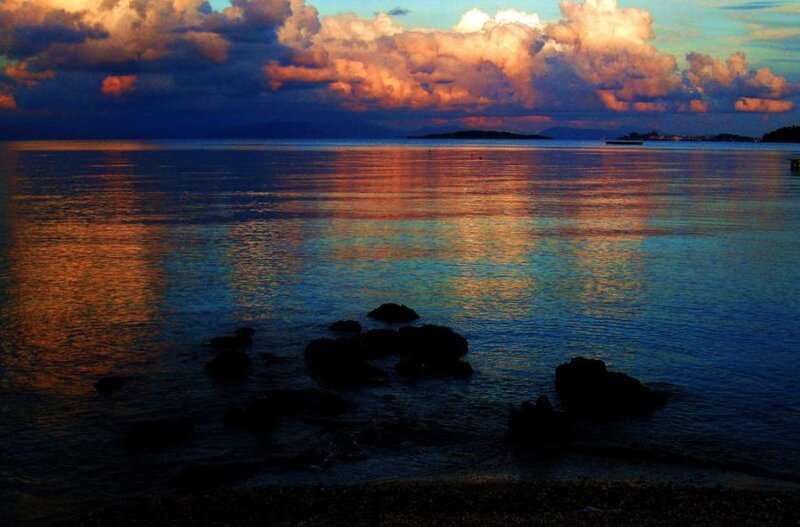 Silhouetted Rocks at Sunset — Blue