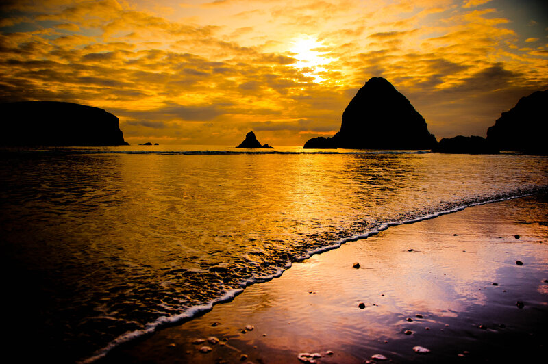 Silhouetted Rocks at Sunset — Gold, Dramatic