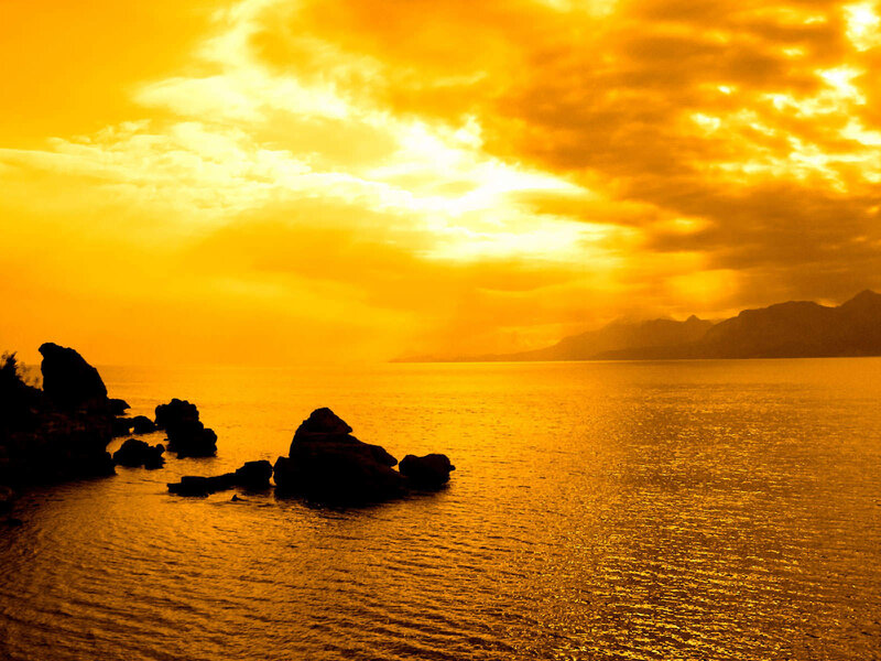 Silhouetted Rocks at Sunset — Orange, Dramatic, Photograph, Sea