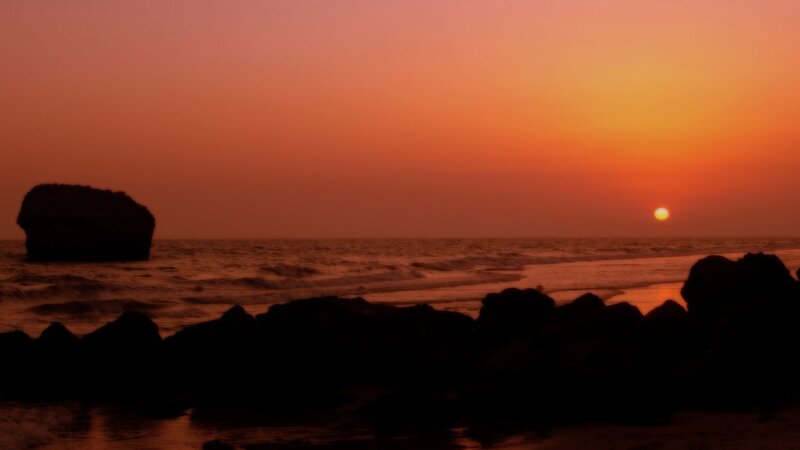 Silhouetted Rocks at Sunset — Orange, Serene, Photograph, Sun, Ocean