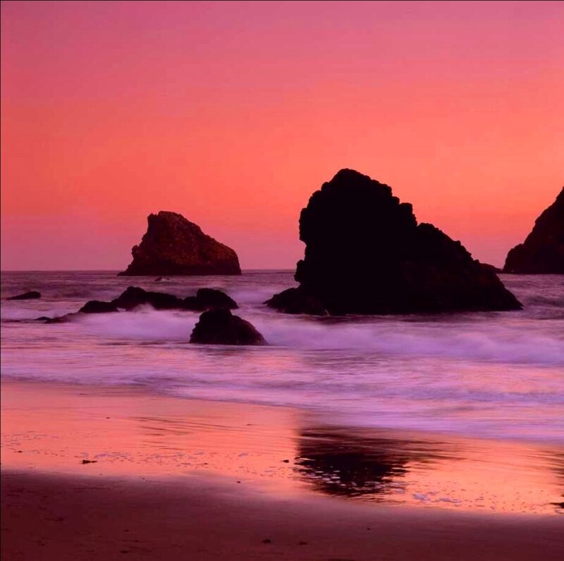 Silhouetted Rocks at Sunset — Pink