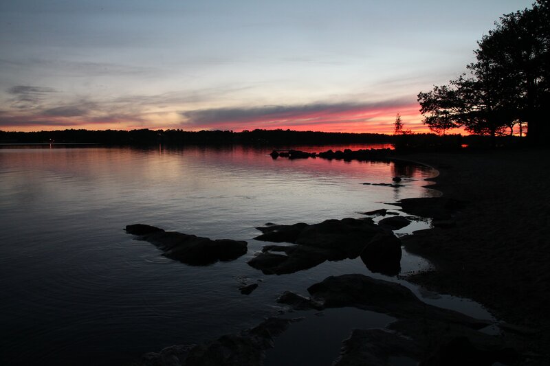 Silhouetted Rocks at Sunset — Red, Serene
