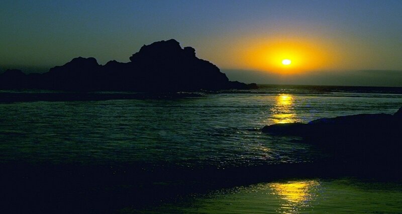 Silhouetted Rocks at Sunset — Yellow