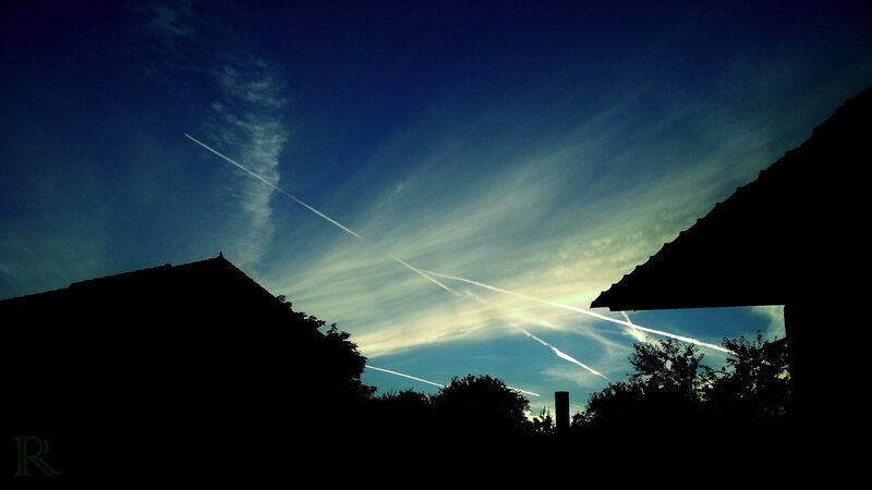 Silhouetted Rooftops at Dusk — Blue