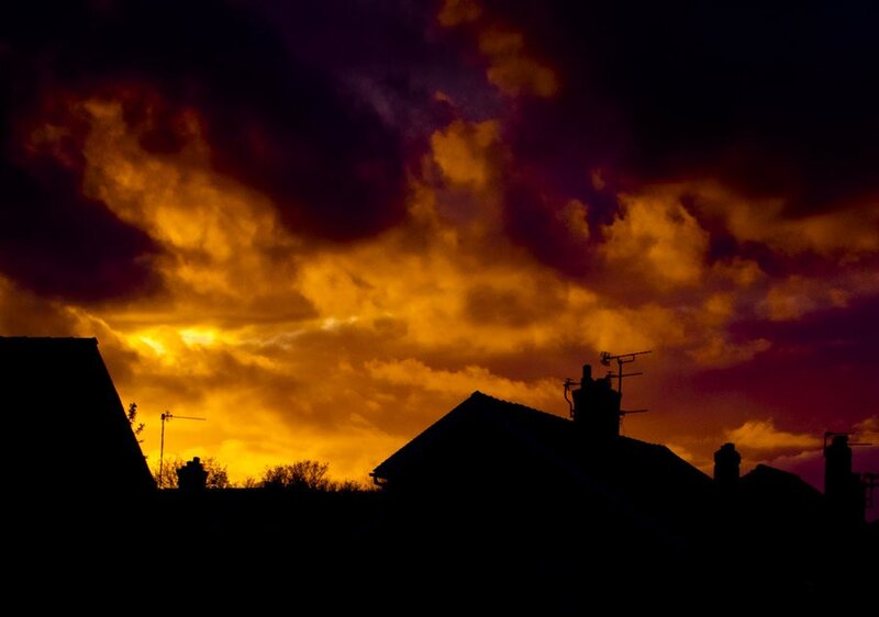 Silhouetted Rooftops — Orange, Dramatic, Sunset