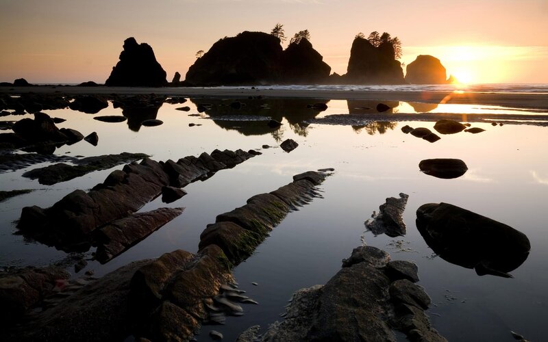 Silhouetted Sea Stacks — Orange, Serene, Sunset, Photograph, Rocks, Beach, Sun