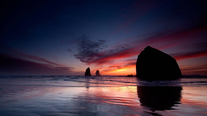 Silhouetted Sea Stacks — Purple, Dramatic, Sunset