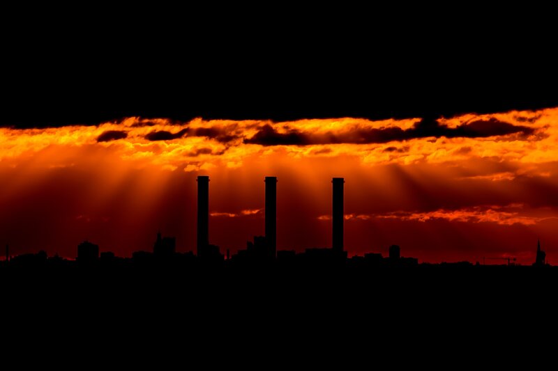 Silhouetted Smokestacks