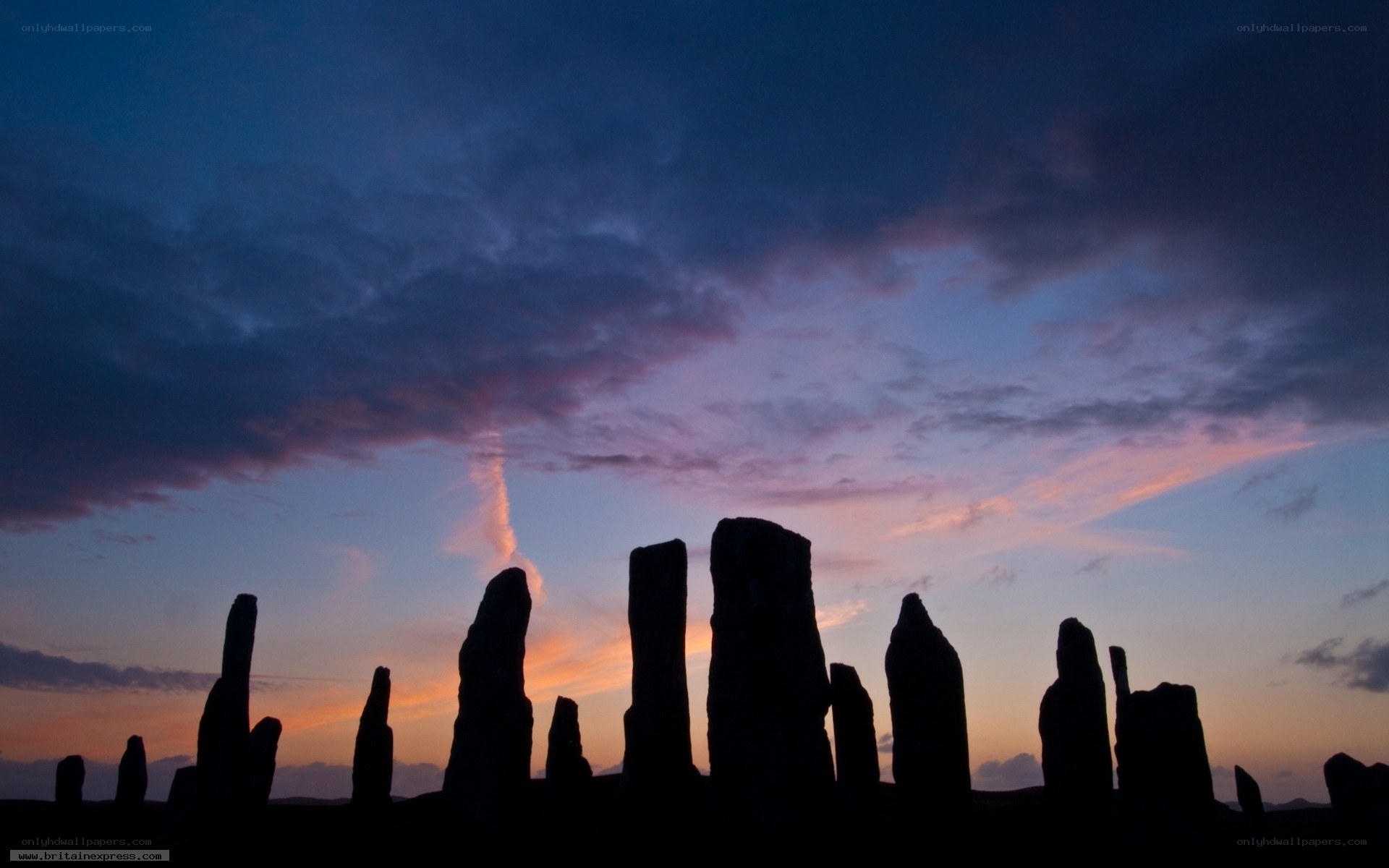 Silhouetted stone circle at dusk