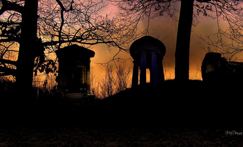 Silhouetted Tombs at Dusk