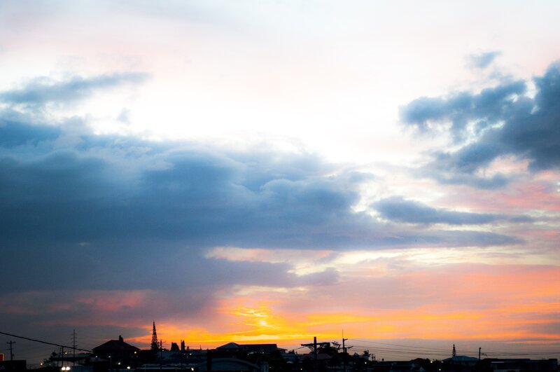 Silhouetted Town at Sunset — Orange
