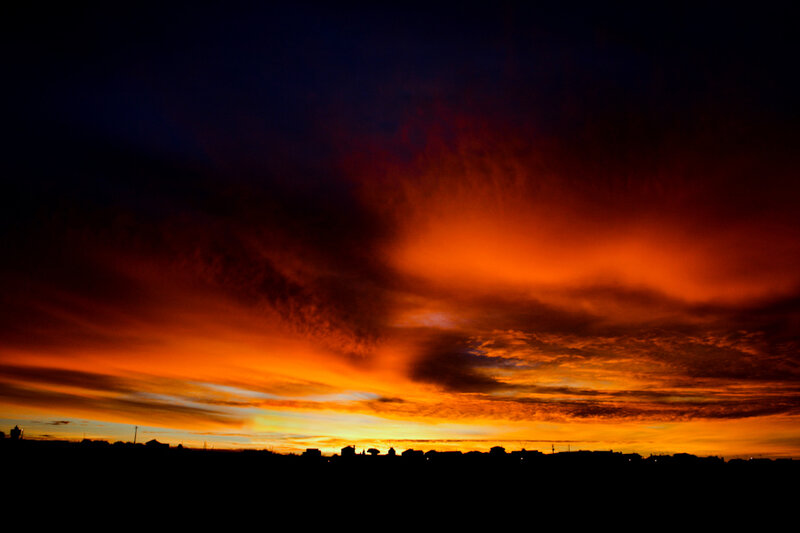 Silhouetted Town at Sunset
