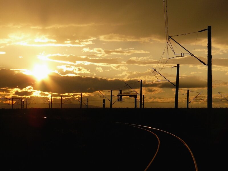 Silhouetted Train Tracks — Gold, Dramatic