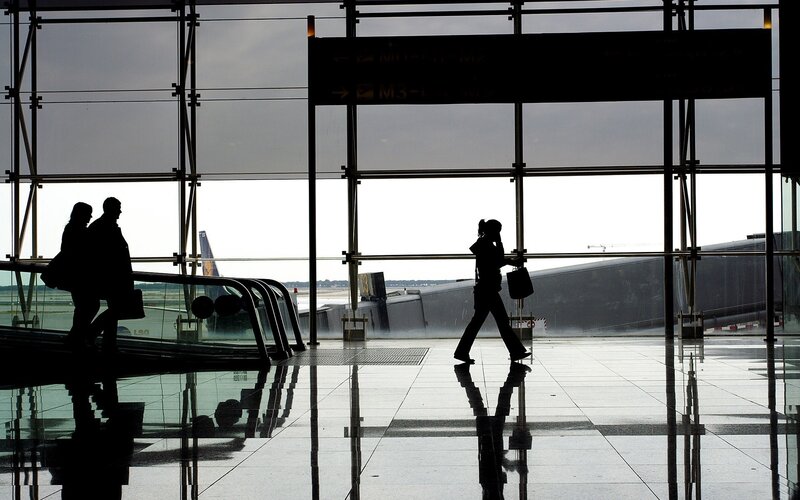 Silhouetted Travelers — Black